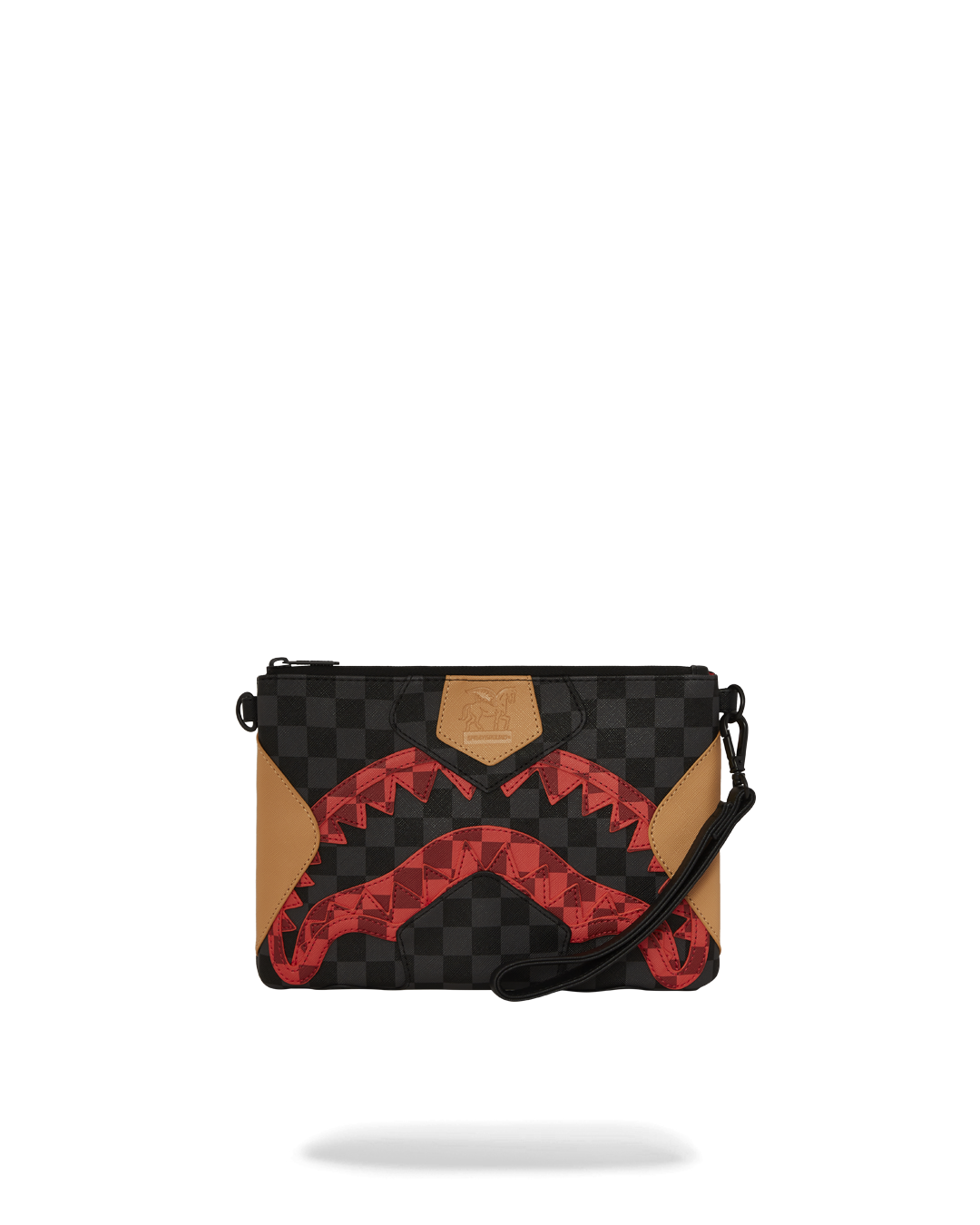 Model carrying the crossover purse as a wristlet during a night out