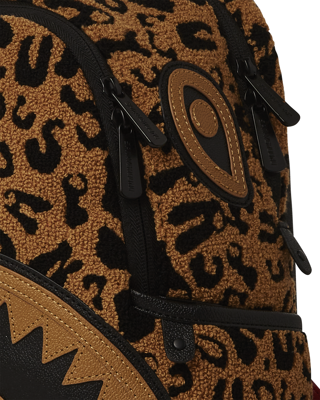 Front view of stylish female backpack in faux leather with gold zipper detailing