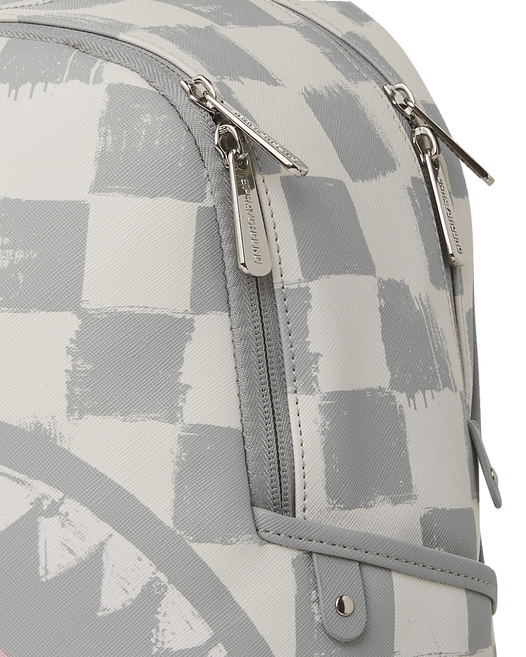 Savage Faux Leather Crossbody Bag in Cream, worn over the shoulder with side pockets visible