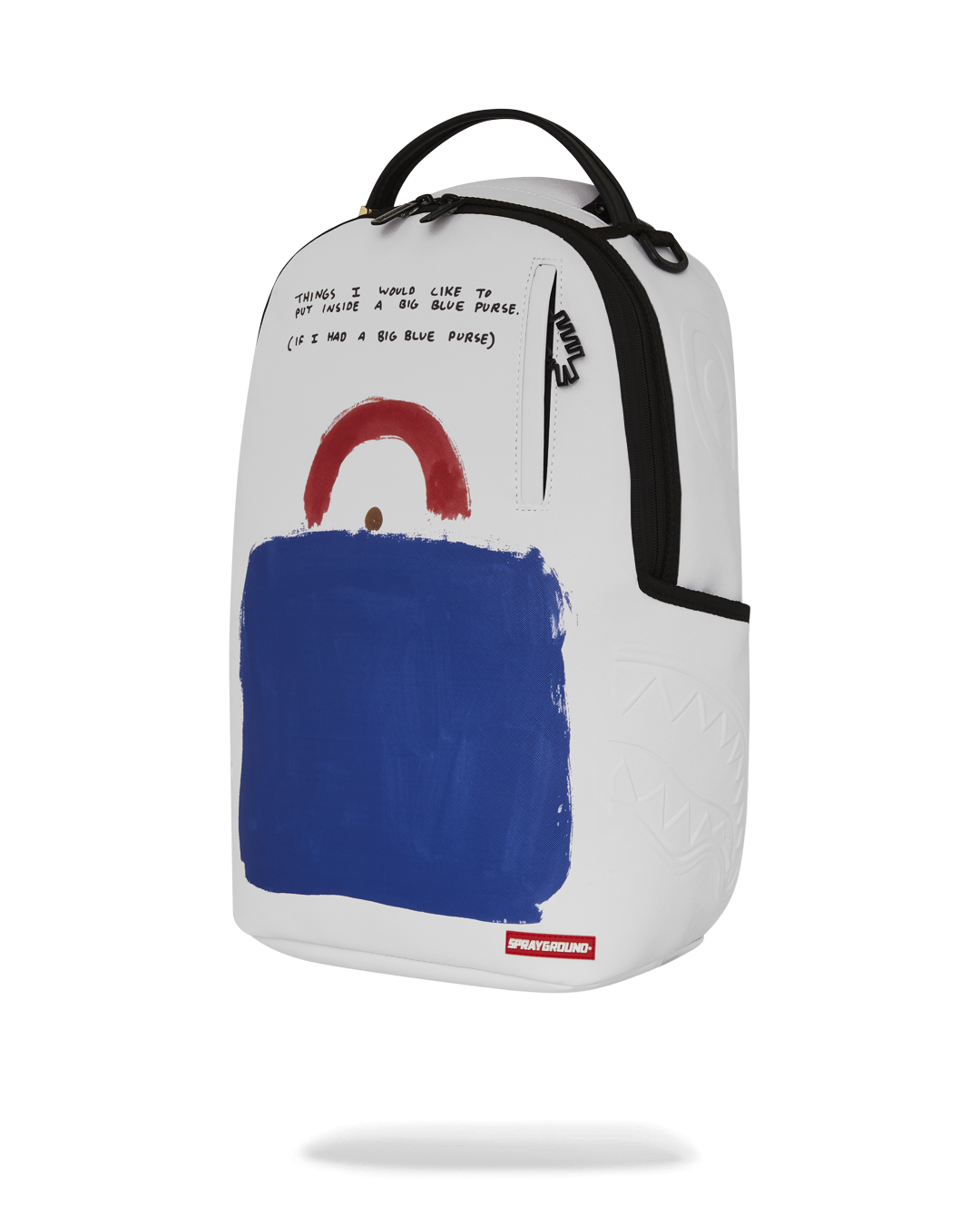 Interior of faux leather art backpack showing laptop compartment and organization pockets