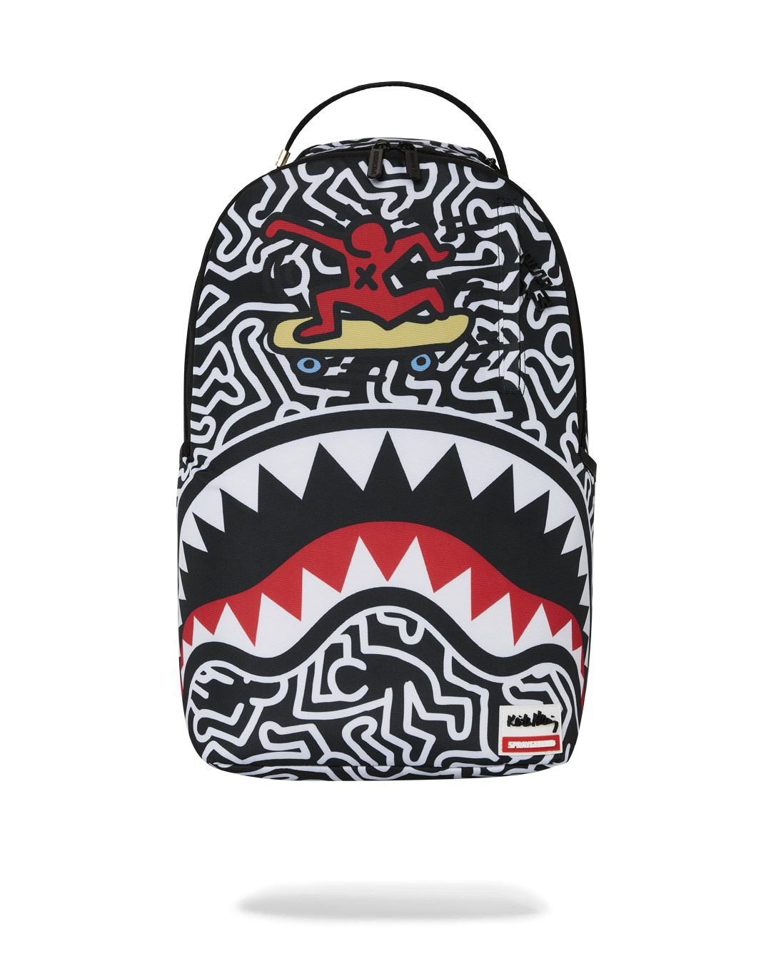 Close-up of shark mouth detail on Keith Haring skater backpack