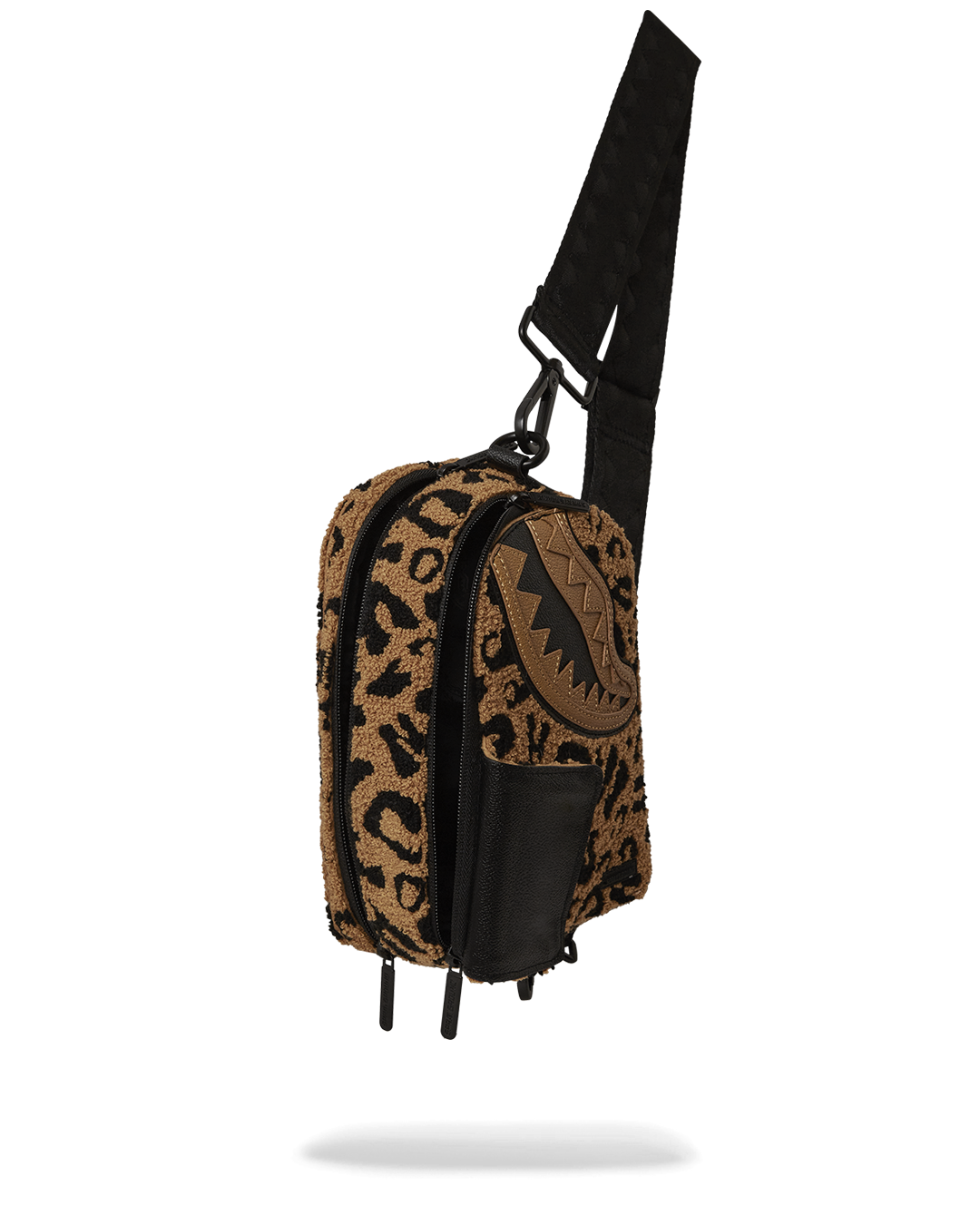 Front view of faux leather crossbody bag worn across the chest