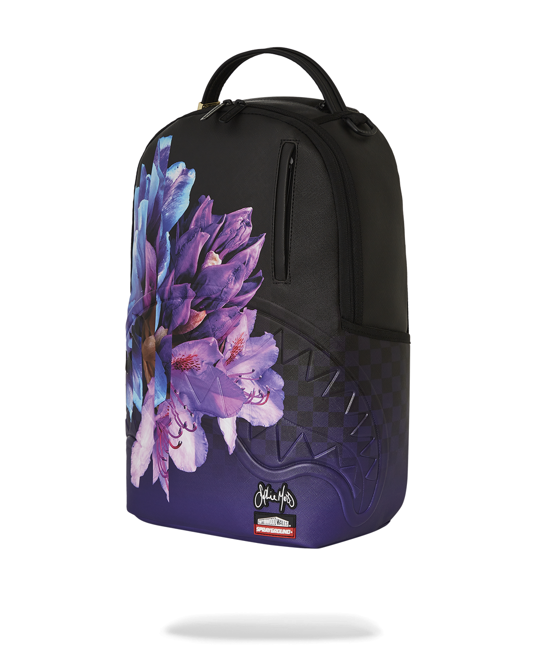 Side profile of the pink Sprayground backpack highlighting its ergonomic features.