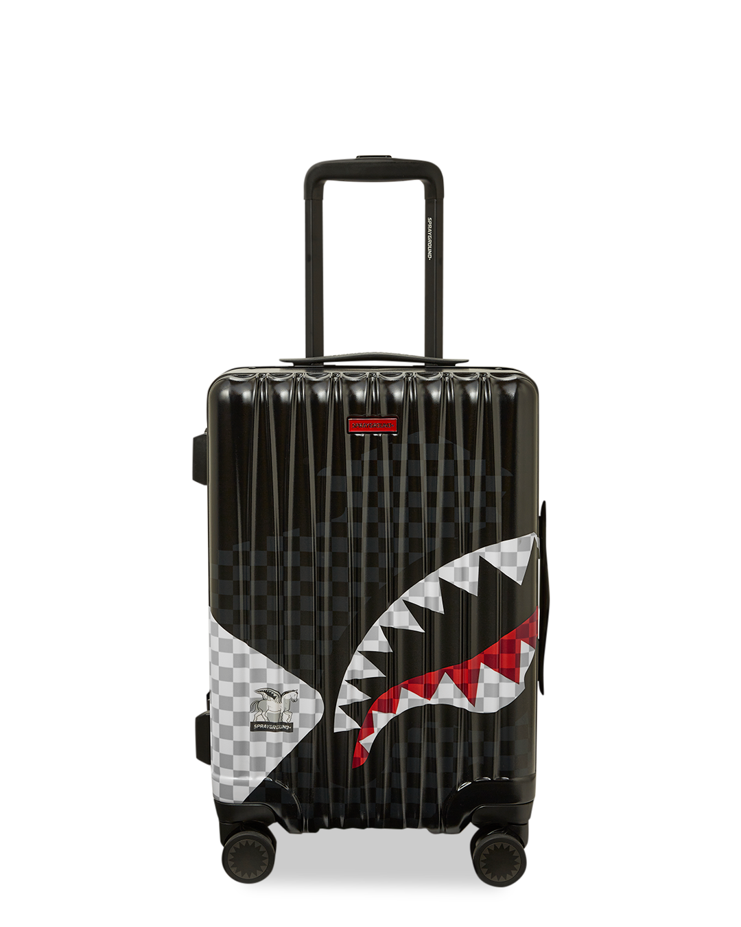 Sprayground hardshell carry-on luggage in use at an airport, showcasing its durability and smooth movement