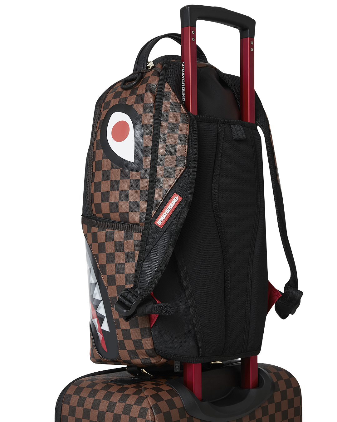 Close-up of the luggages faux leather handle and YKK zipper frame, highlighting its premium quality.