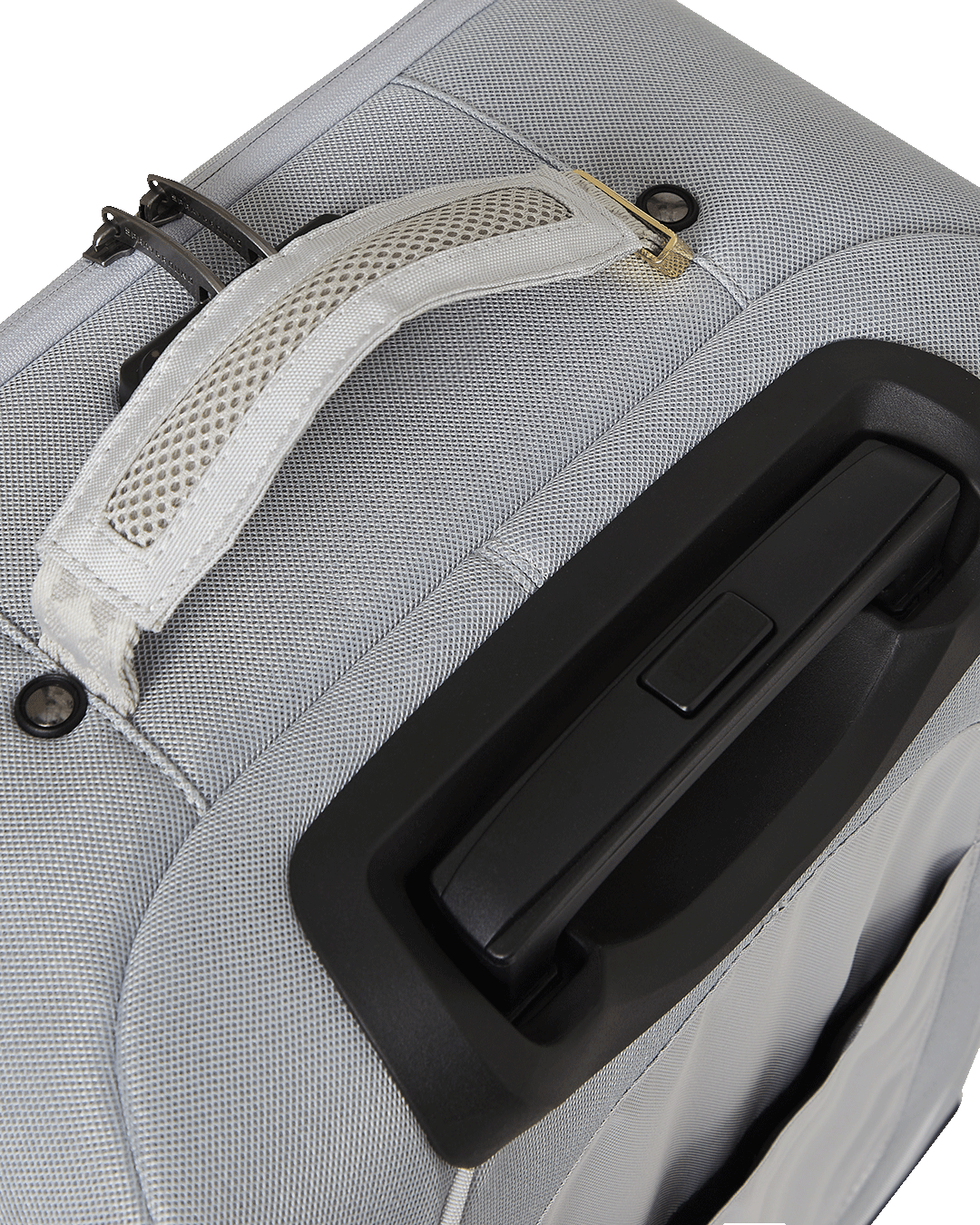 Proximo Special Ops hard shell carry-on luggage in use at an airport, showcasing its 4 dual spinning wheels