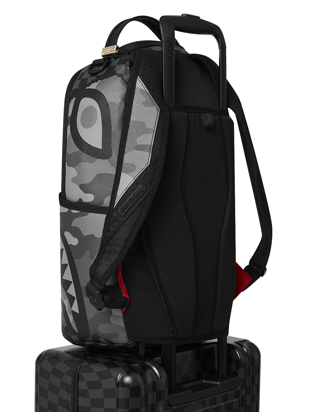 Open interior of the hard shell luggage showcasing multiple pockets and organization features.
