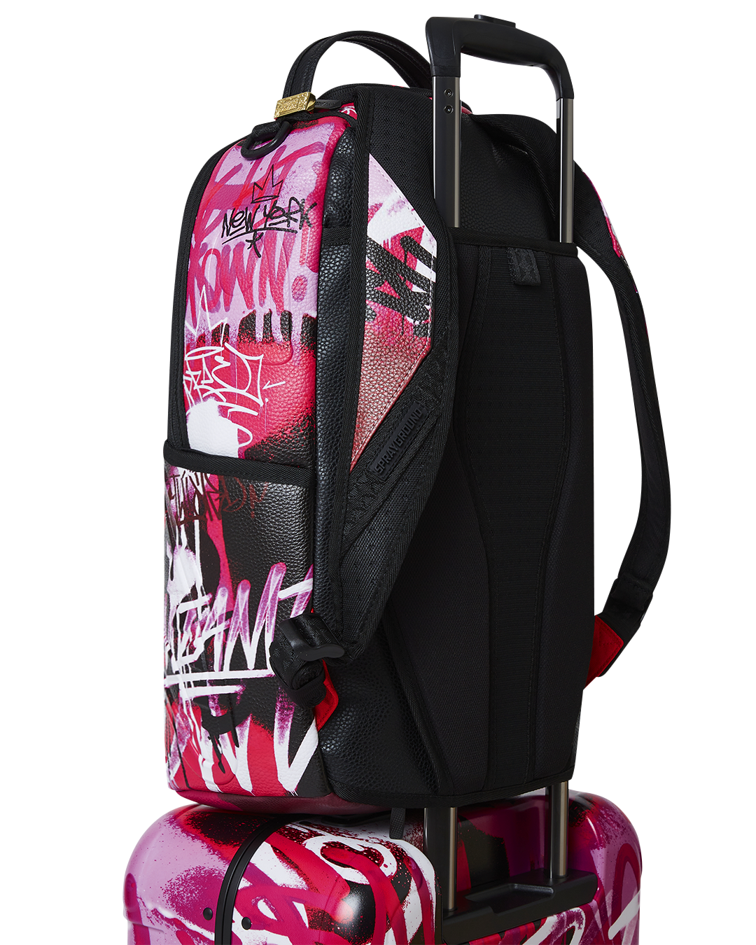 Spinner wheels and telescoping handle of durable hard-shell luggage