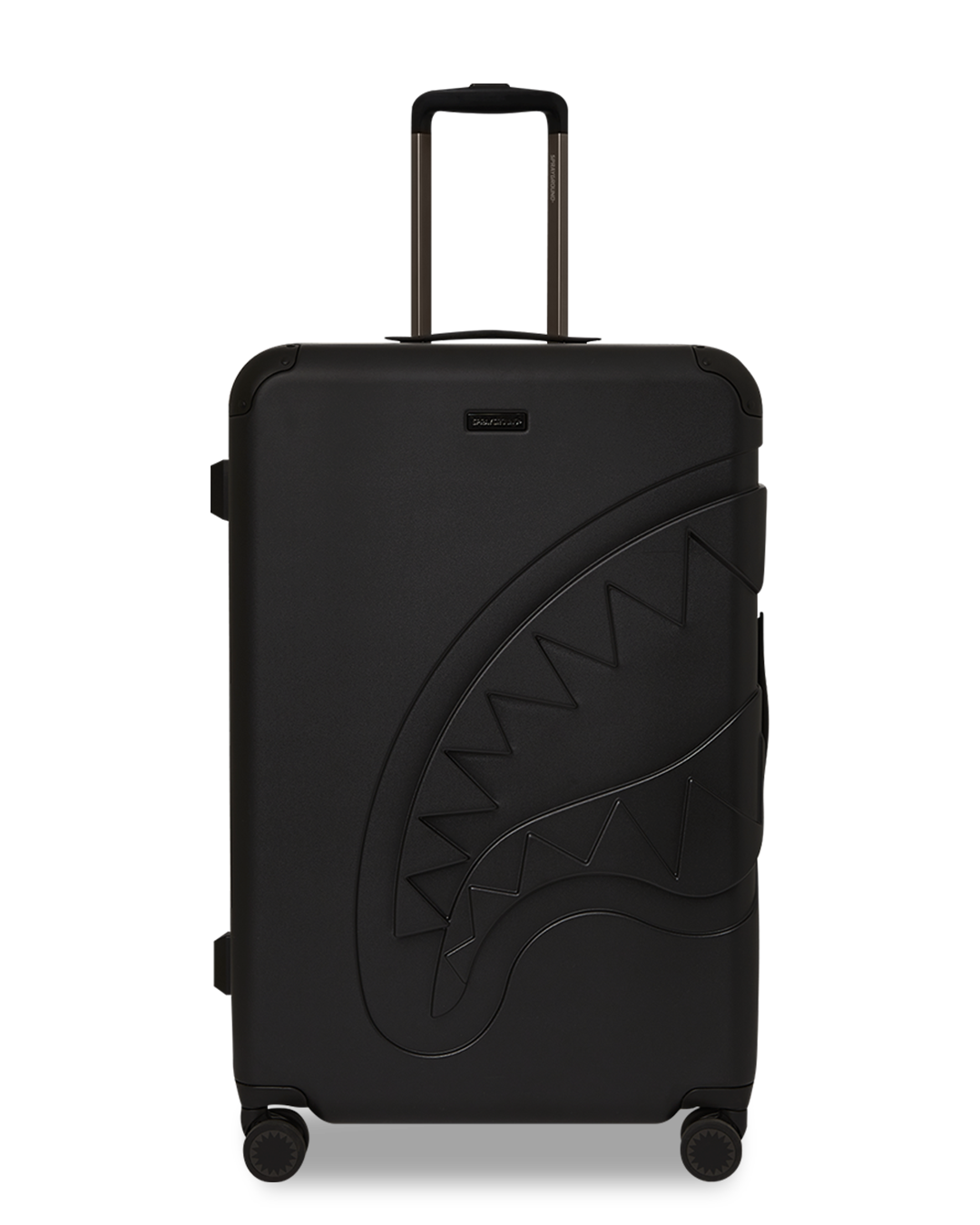 Luggage with spinner wheels and telescoping handle on airport terminal floor