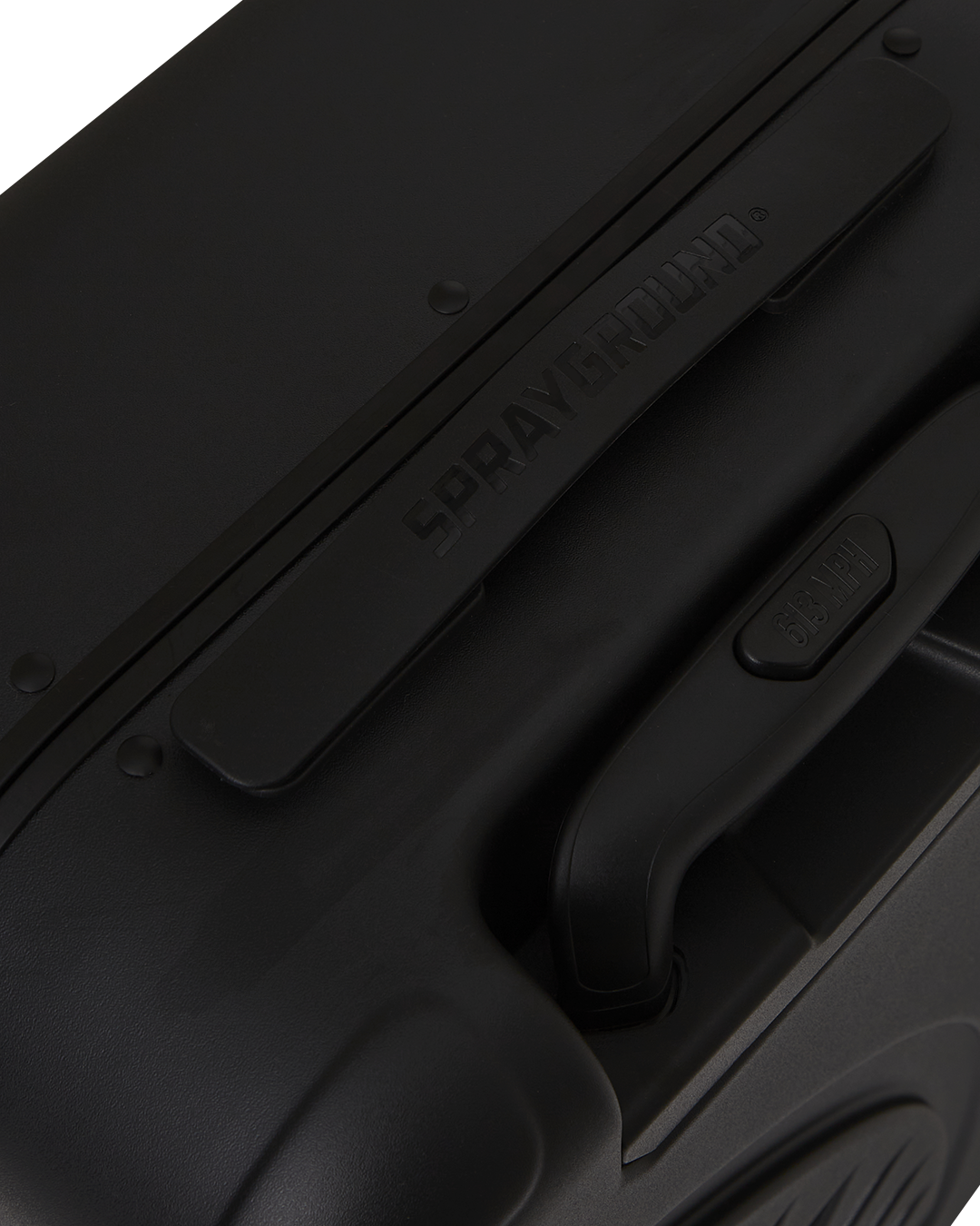 Close-up of JetBlack hardshell luggage wheels, highlighting the smooth spinner action.