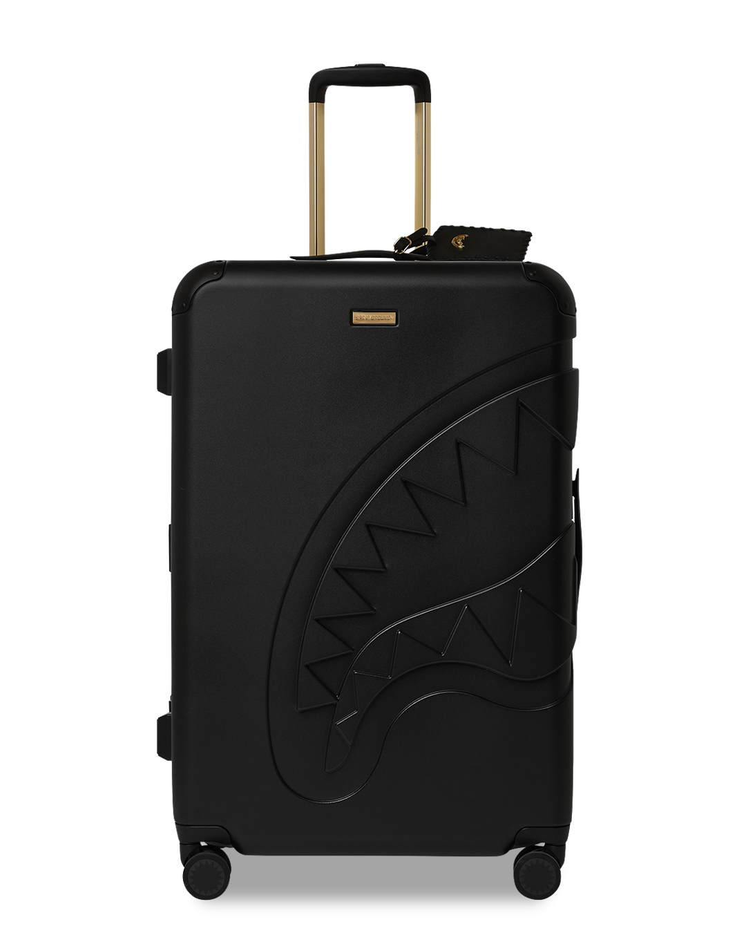 Side profile of full-size JetBlack luggage on a city street.