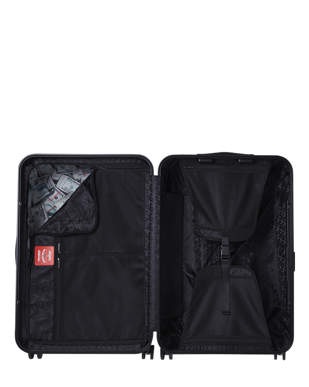 Close-up of JetBlack luggage with gold hardware and double spinner wheels.