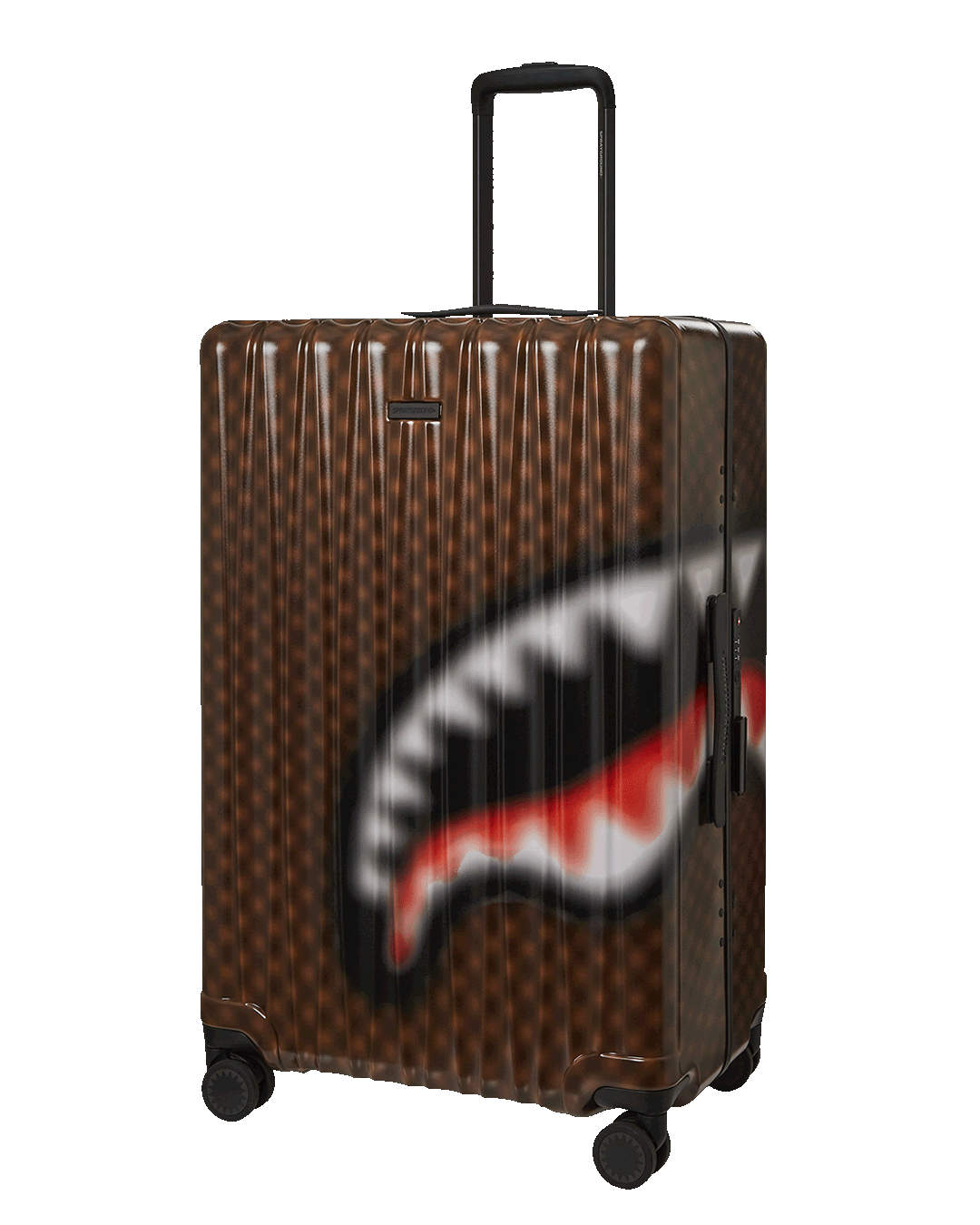 Close-up of Sharks in Paris luggage showing polycarbonate shell and shark sculpture detail