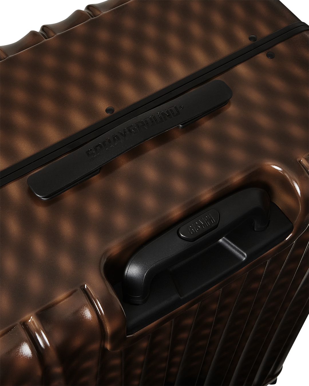 Side view of spinner suitcase with telescoping handle and dual wheels in use
