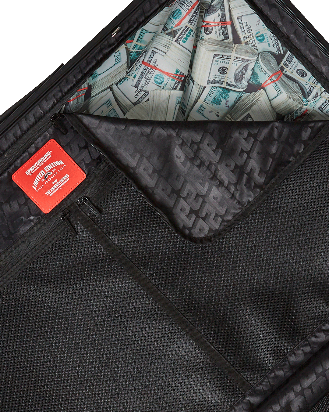 Open interior of hard shell luggage with organized compartments and compression straps