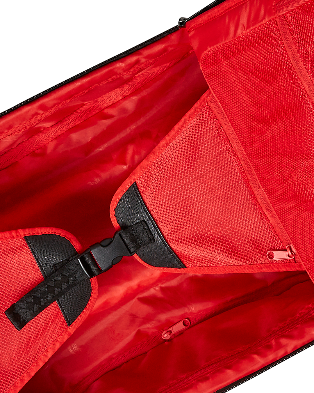 Interior view of Snowwstorm Puffer Imperial luggage showing multiple pockets and compression straps