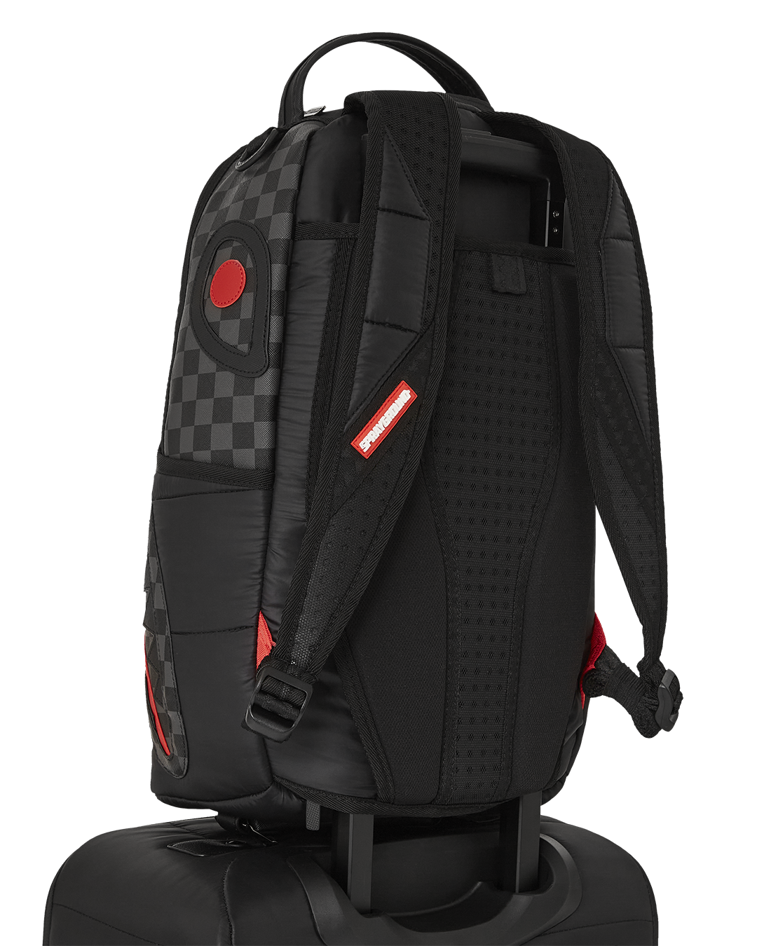 Interior view of Snowwstorm Puffer Imperial luggage showing multiple pockets and compression straps