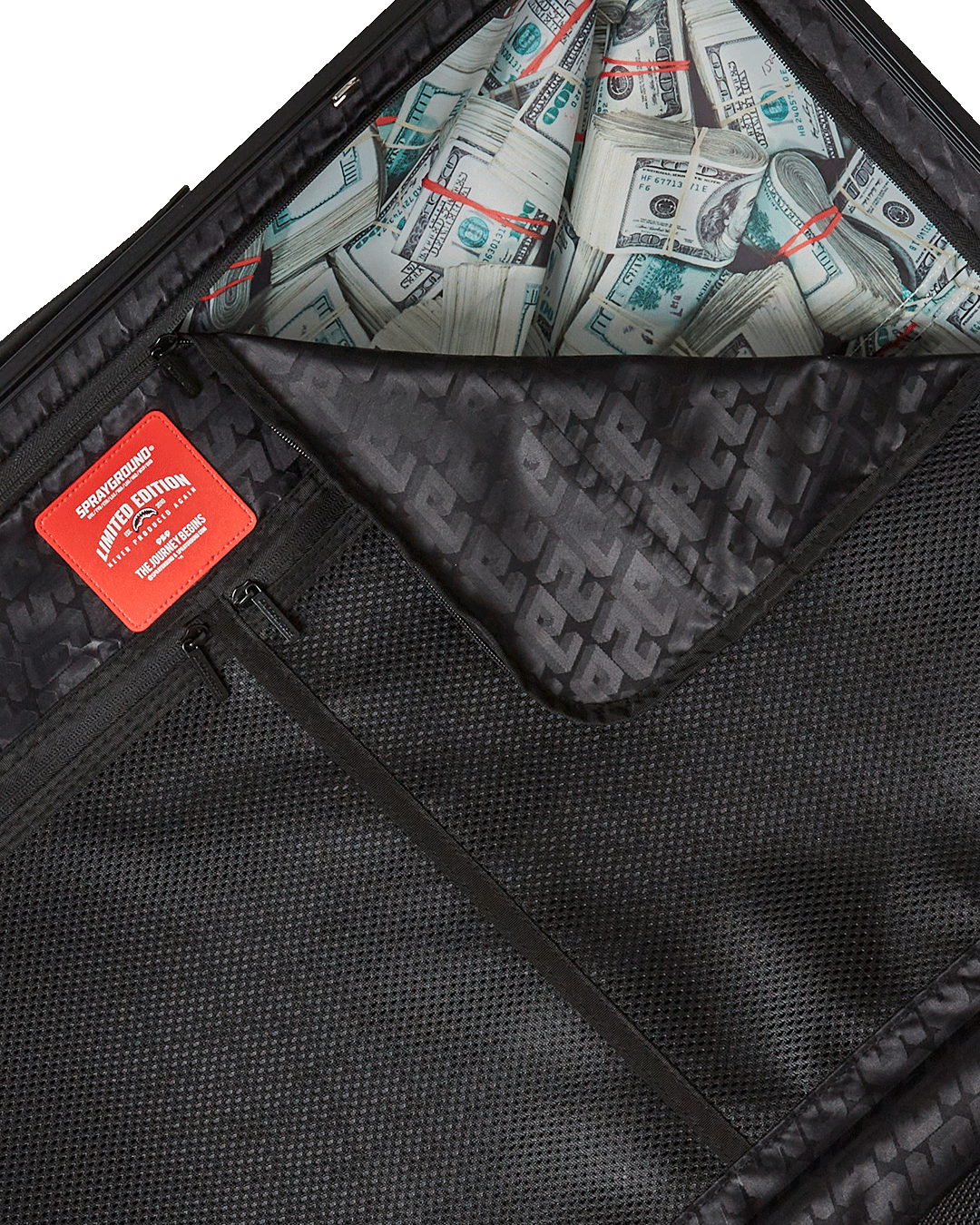 Close-up of the polycarbonate exterior with shark sculpture detail on the suitcase