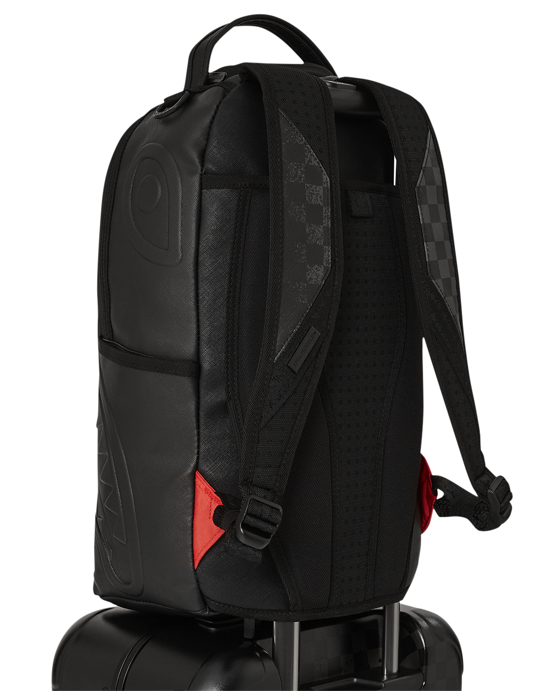Nightsharks luggage in use, rolling effortlessly with dual spinner wheels at an airport terminal.