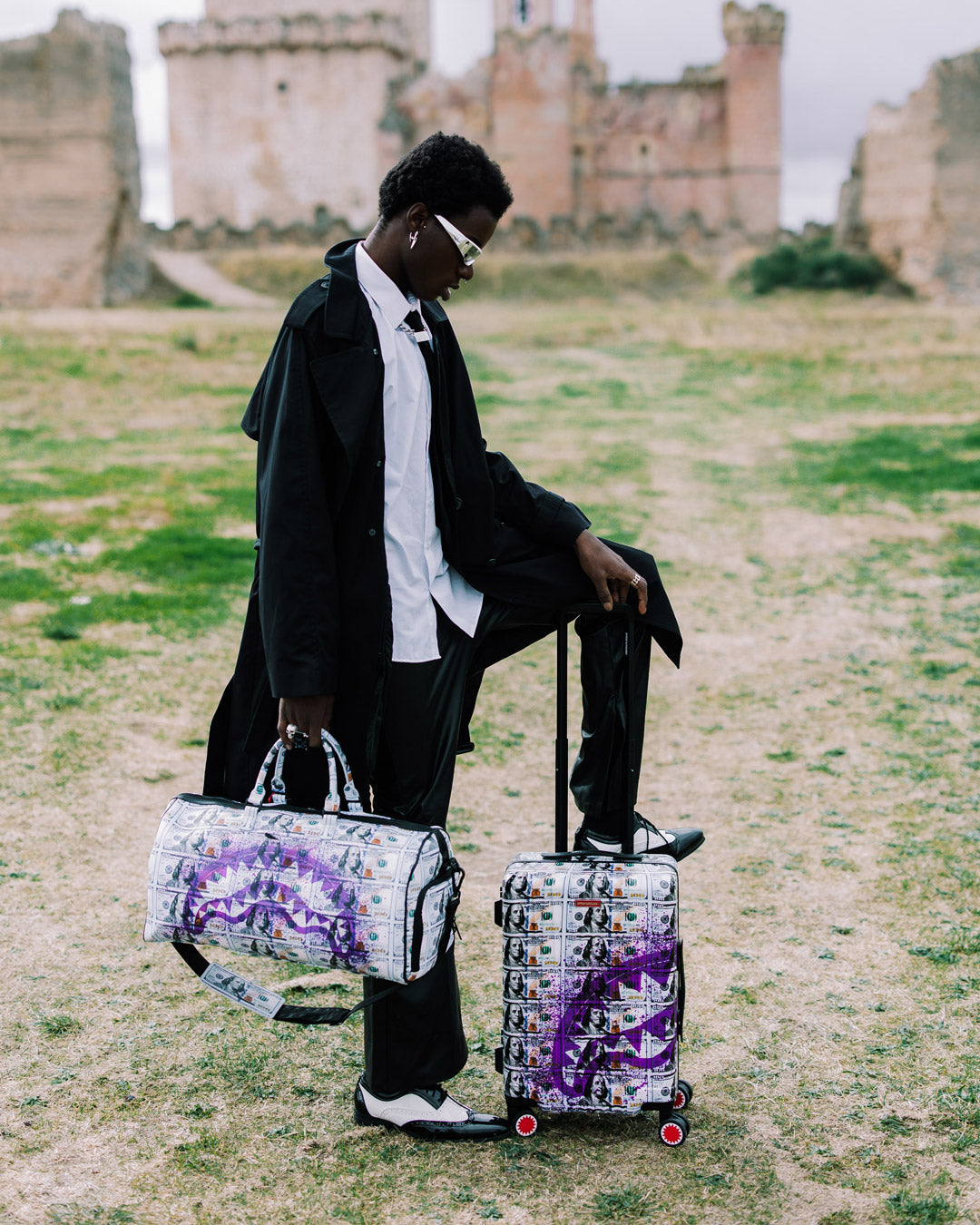 Billions in the Bank hardshell carry-on luggage with a sleek, modern design and patented shark sculpture.