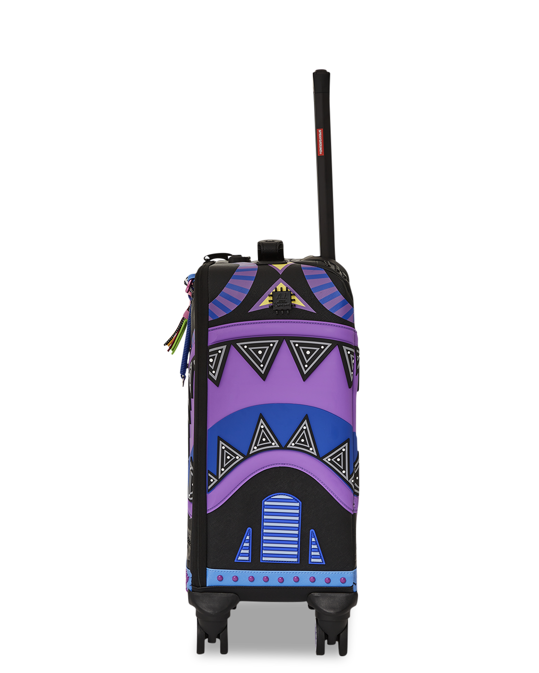 Sandflower luggage front view with shark sculpture design, packed for a weekend trip