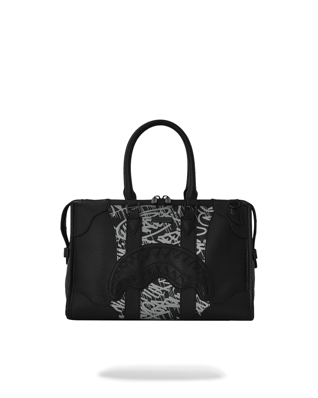 Pyramid mini duffle bag in use with adjustable strap, carried crossbody