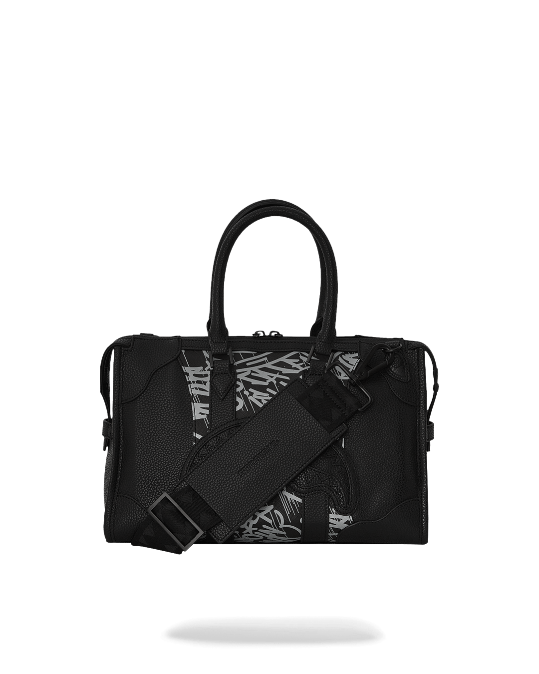 Pyramid mini duffle bag in use with adjustable strap, carried crossbody