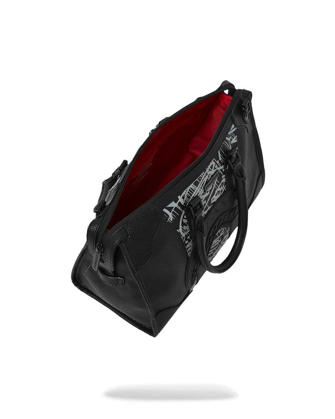 Mini duffle bag styled with laptop and water bottle for work or gym
