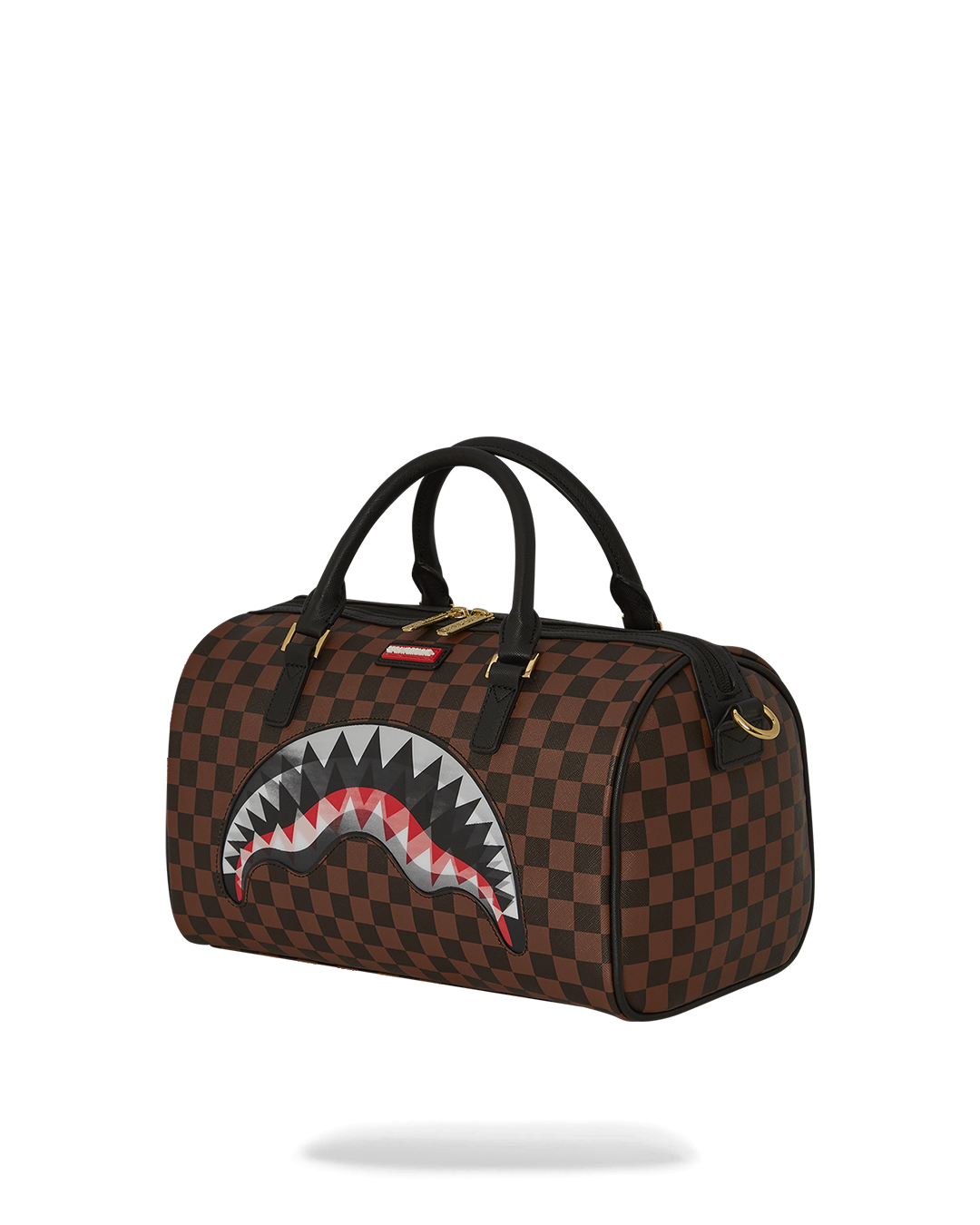Interior zippered pockets and sneaker compartment of the duffle bag