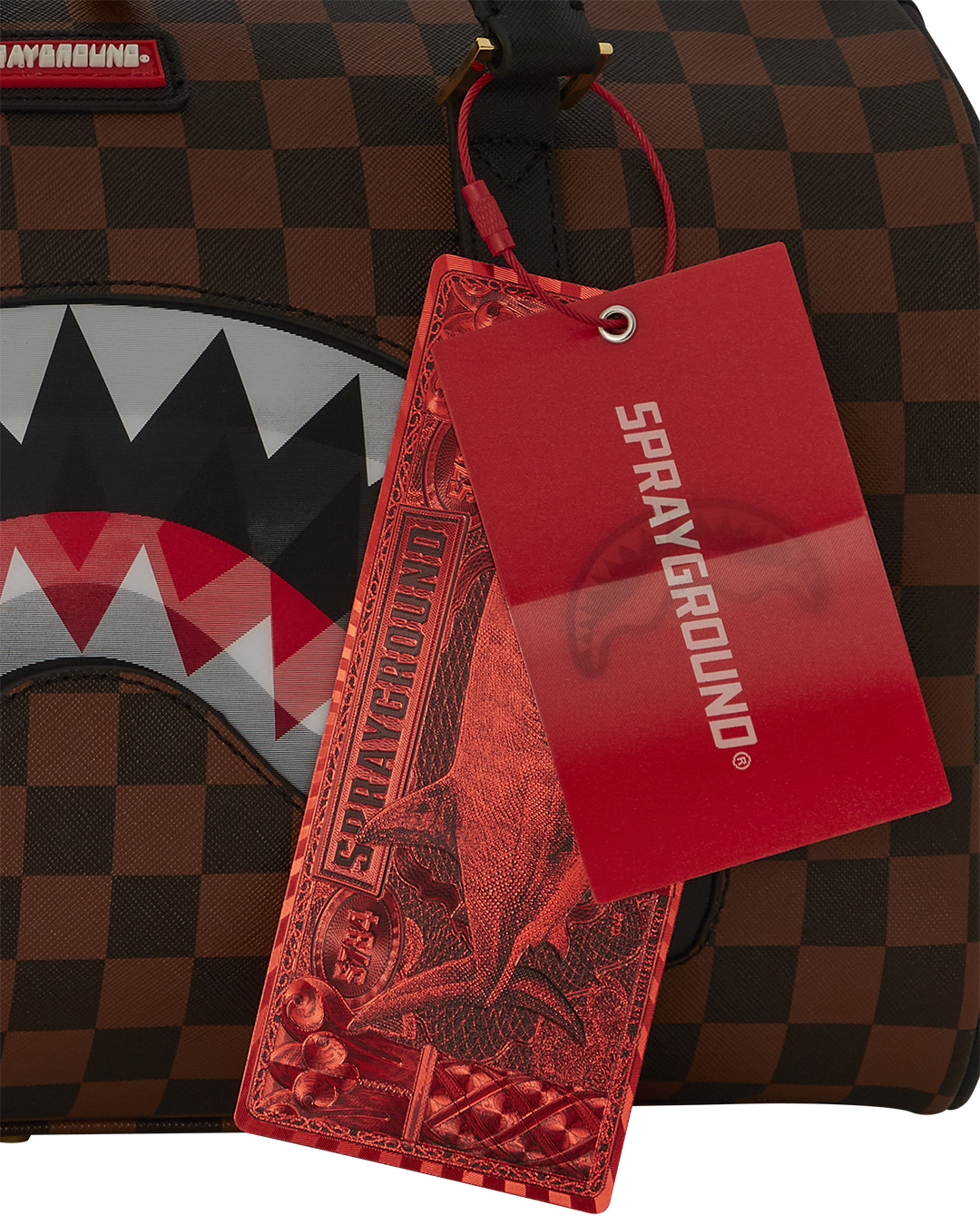 Sharkmouth Mini Duffle Bag worn crossbody with adjustable strap