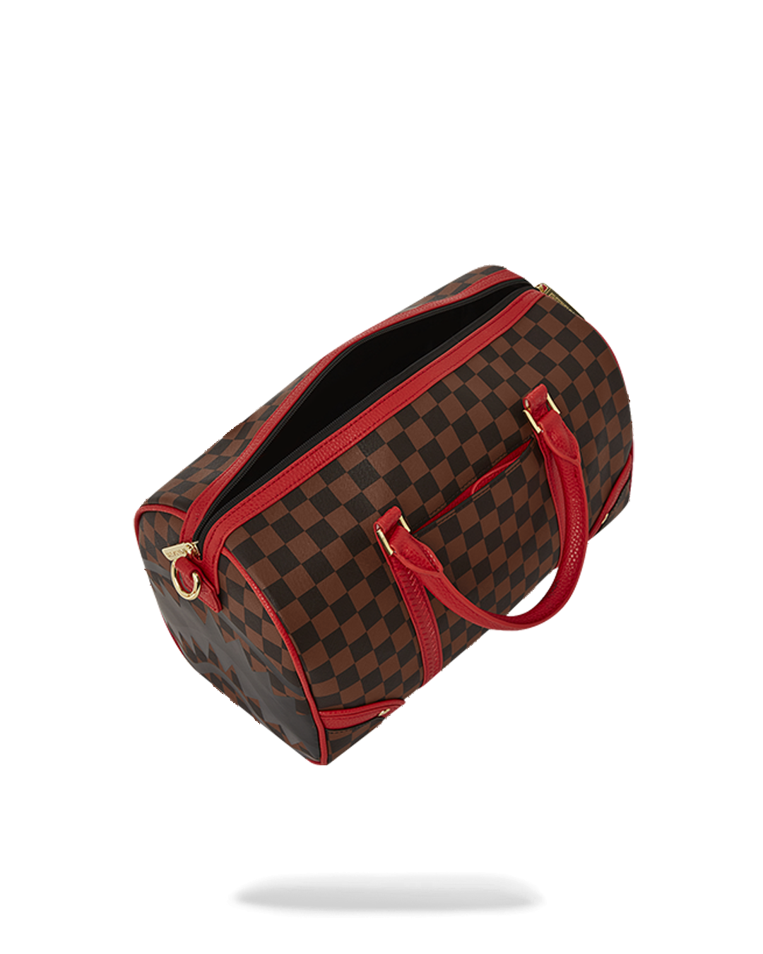 Mini duffle bag worn crossbody, showing adjustable strap