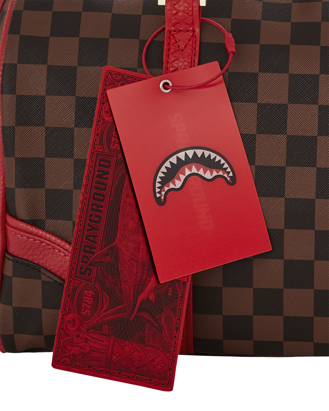 Close-up of faux leather texture on mini duffle bag