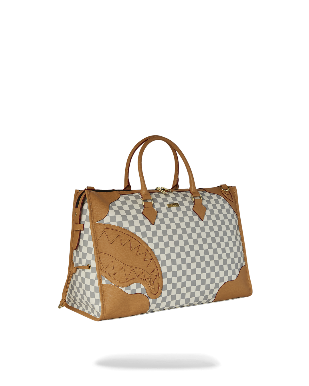 Model carrying the faux leather duffle with adjustable strap during travel