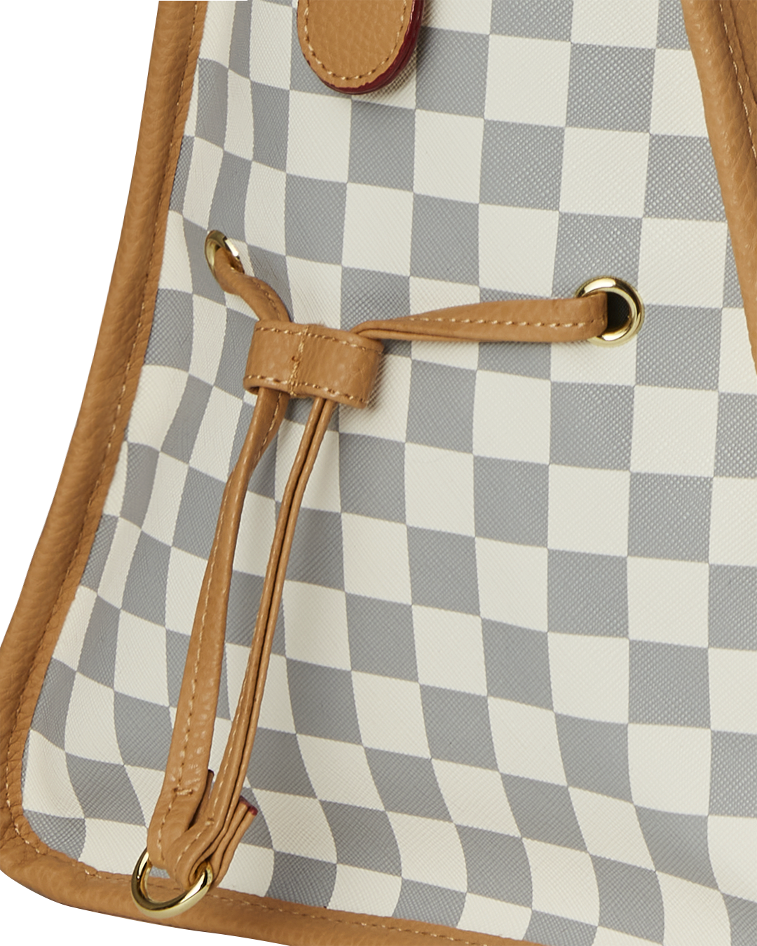 Model carrying the faux leather duffle with adjustable strap during travel