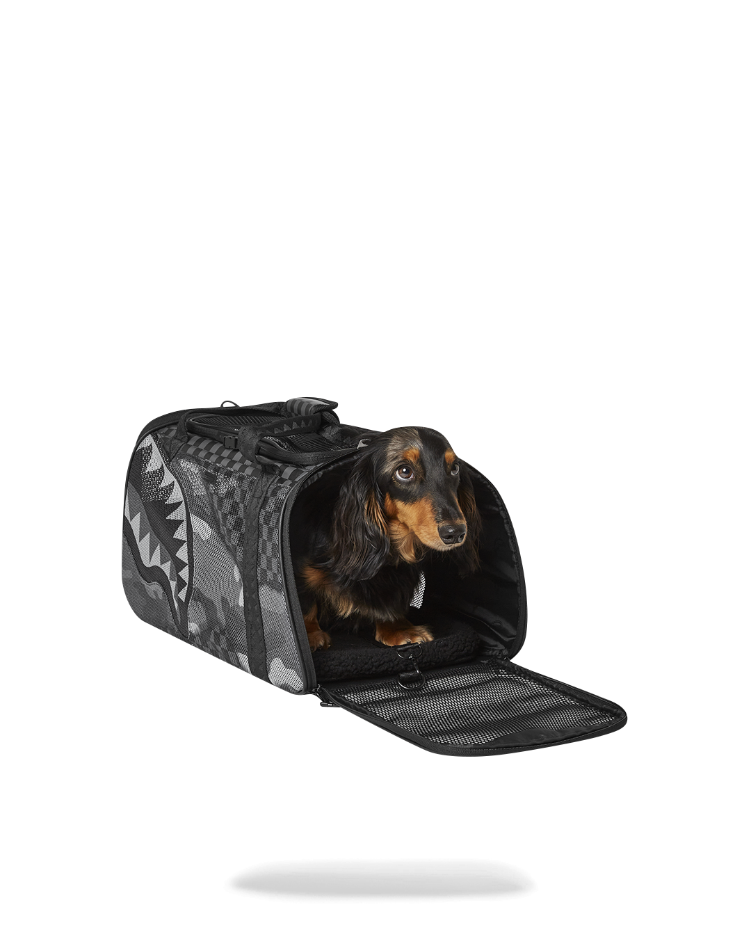 Riptide dog carrier sling with padded shoulder strap for comfort.