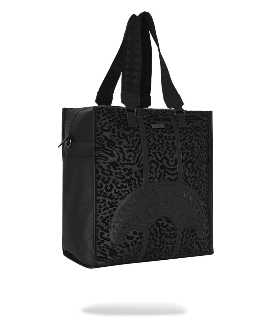 Duffle bag placed on luggage with sleeve attached, ready for travel