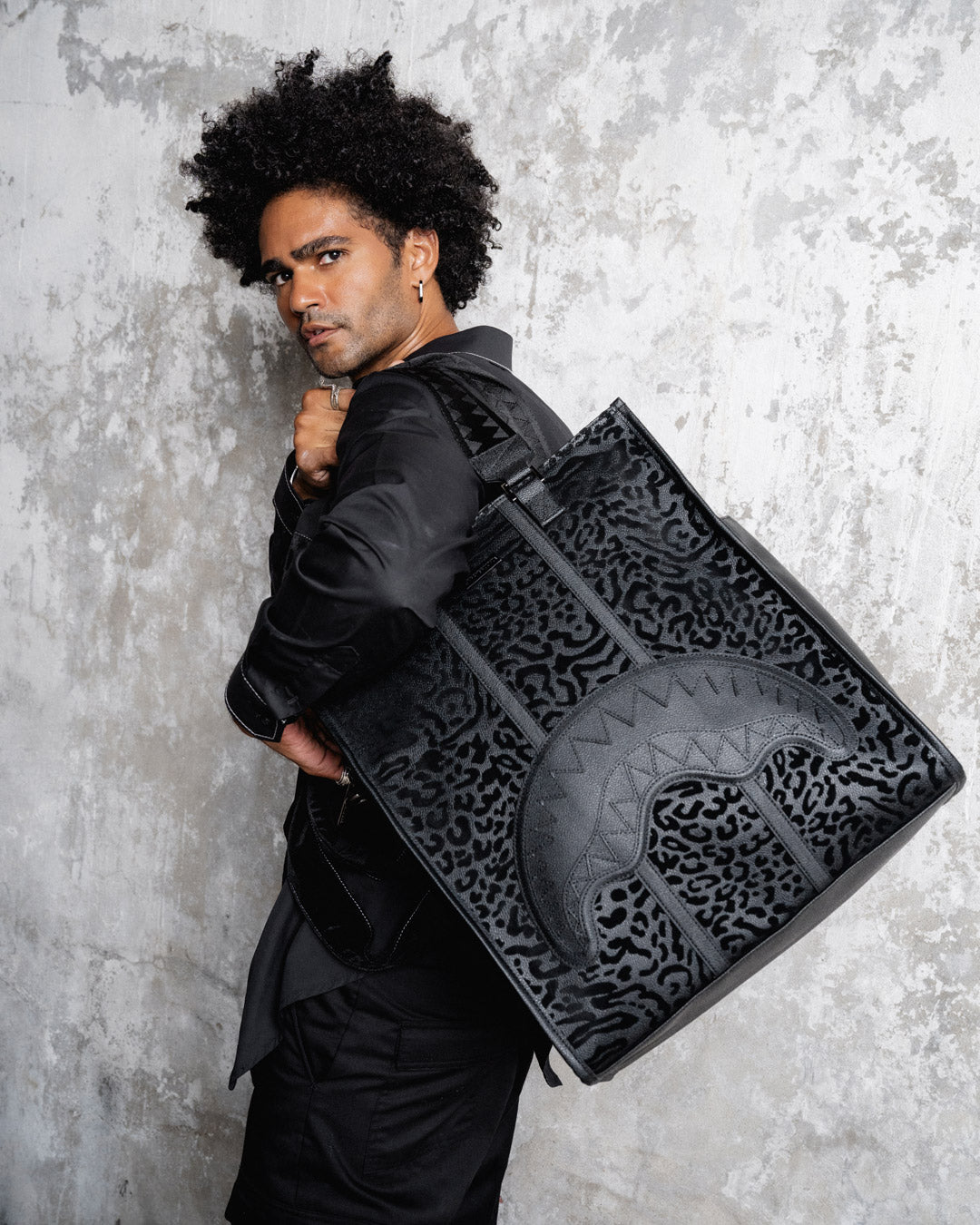 Spycraft Predator duffle bag carried over the shoulder in an urban setting