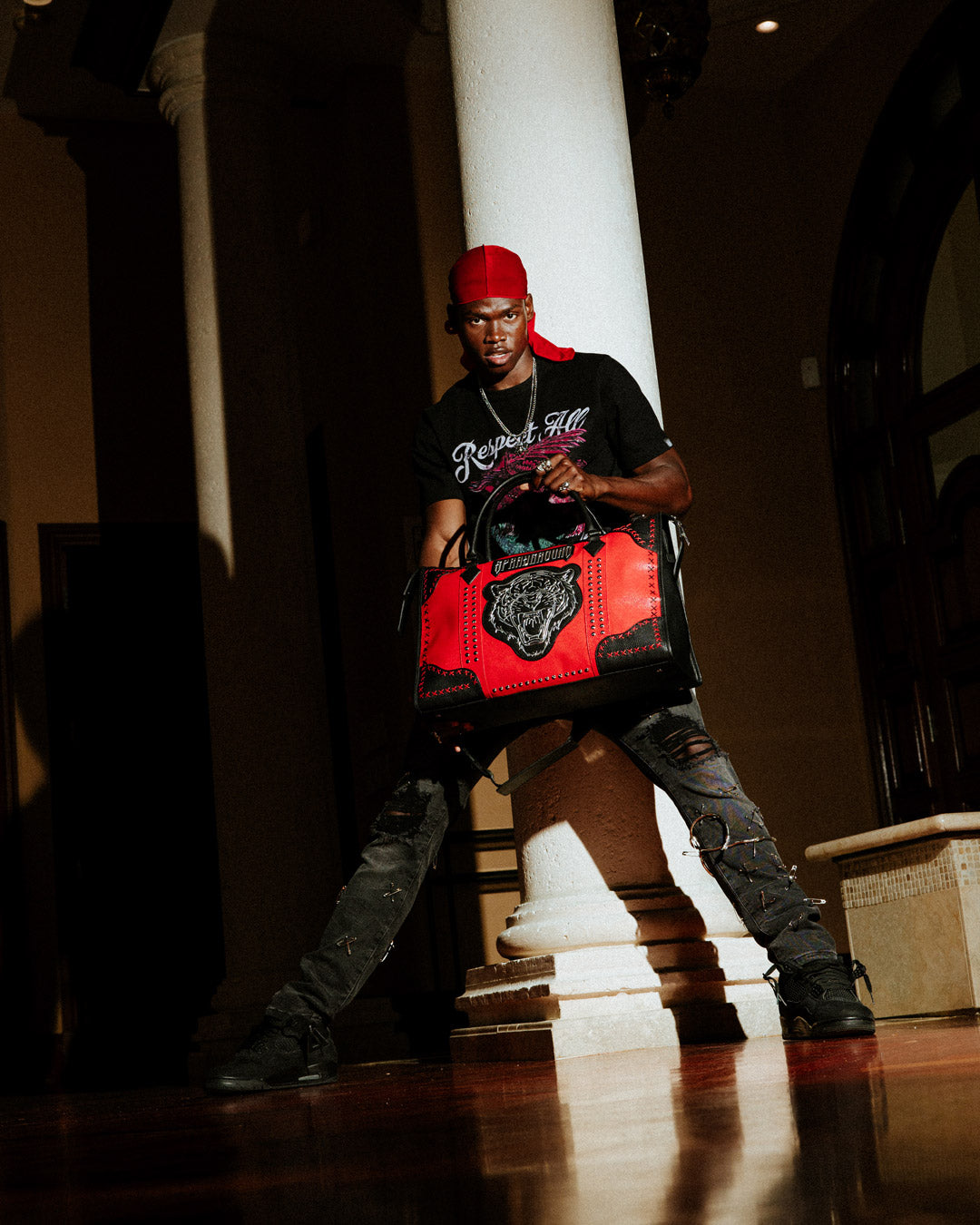 Bronx Brawler pyramid duffle bag with adjustable strap.