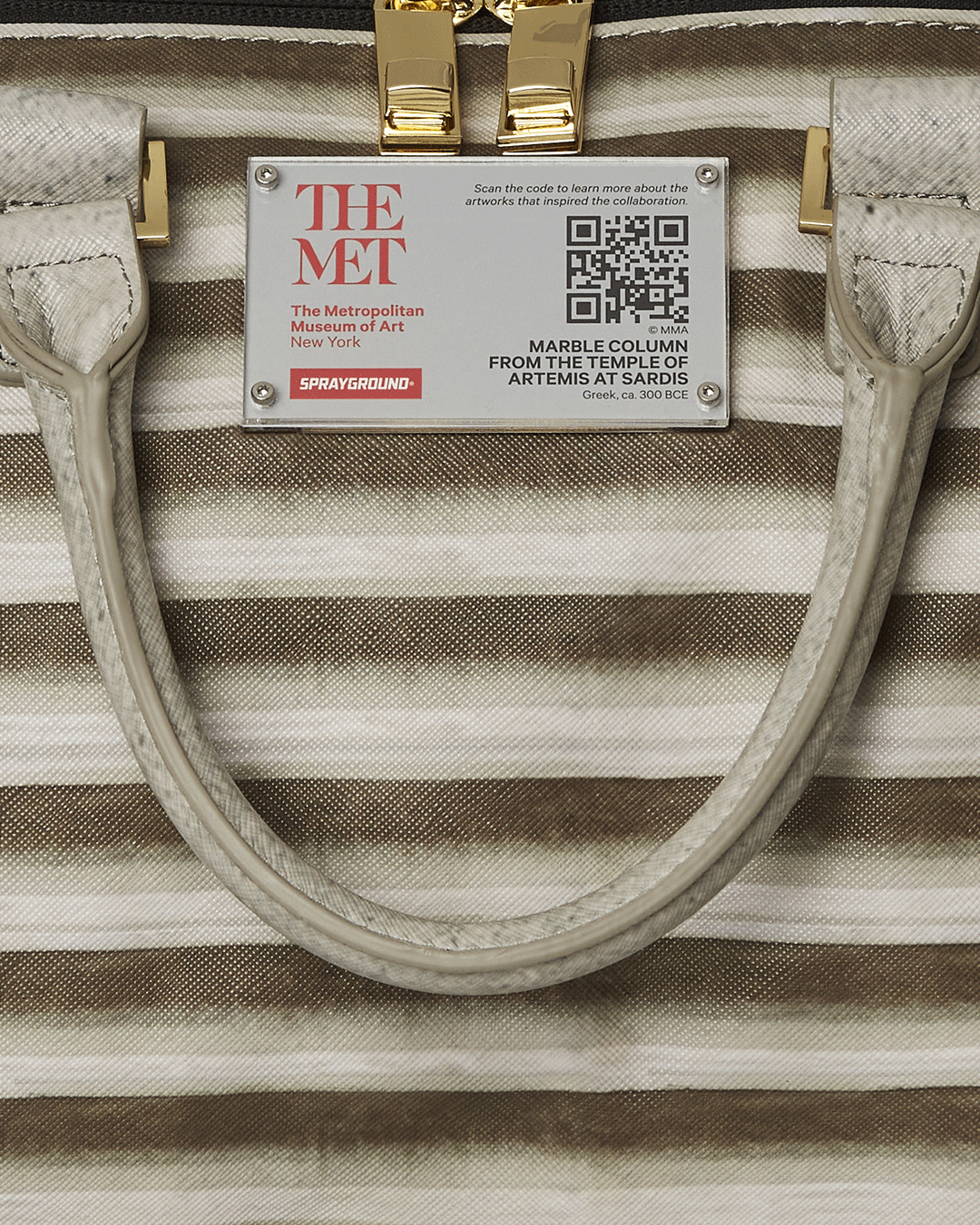 Side view showing the column-inspired pocket and adjustable cross-body strap