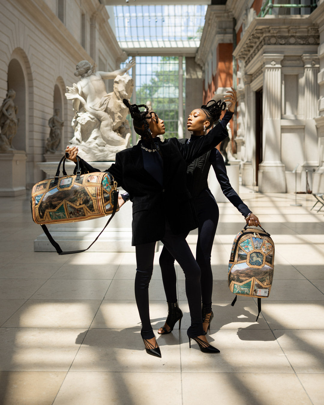 View of the Met Museum Masterpieces rolling duffle bag showcasing art motifs.