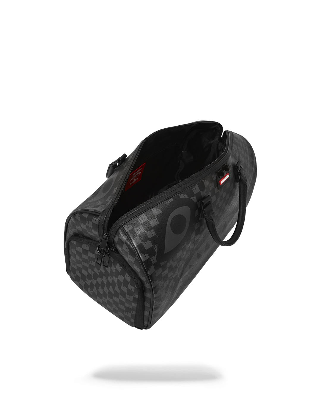 Duffle bag in use, being pulled on wheels with a sneaker pocket visible