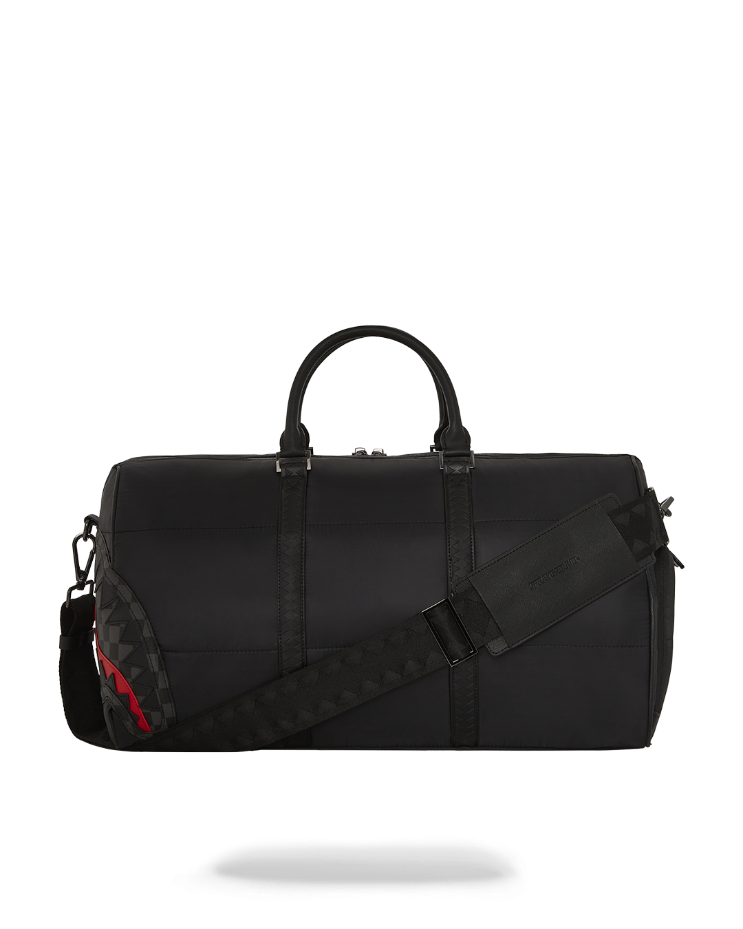 Faux leather puffer duffle bag displayed on a stylish background.
