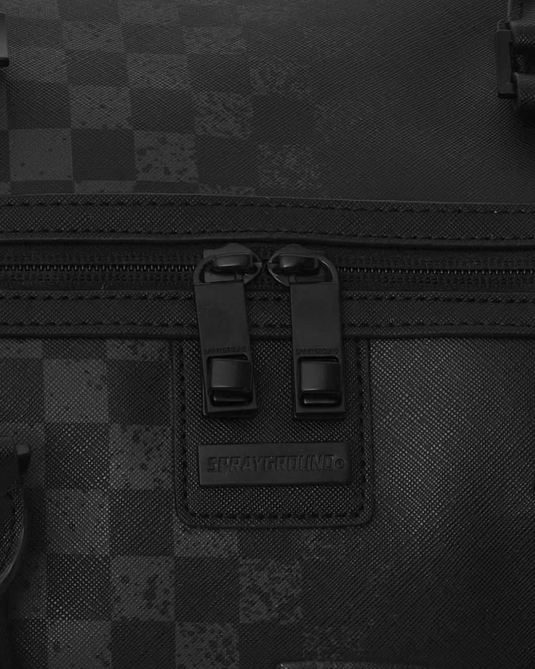 Mens travel duffle bag in hand, highlighting adjustable shoulder straps