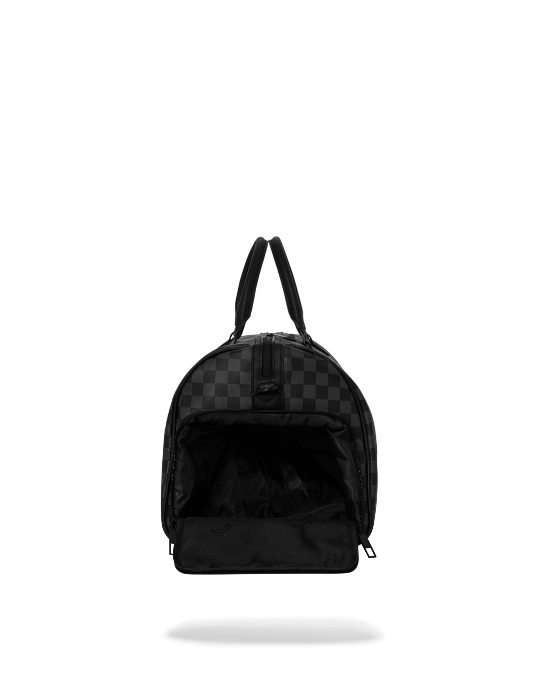 Faux leather duffle bag side view with gold zippers and urban backdrop
