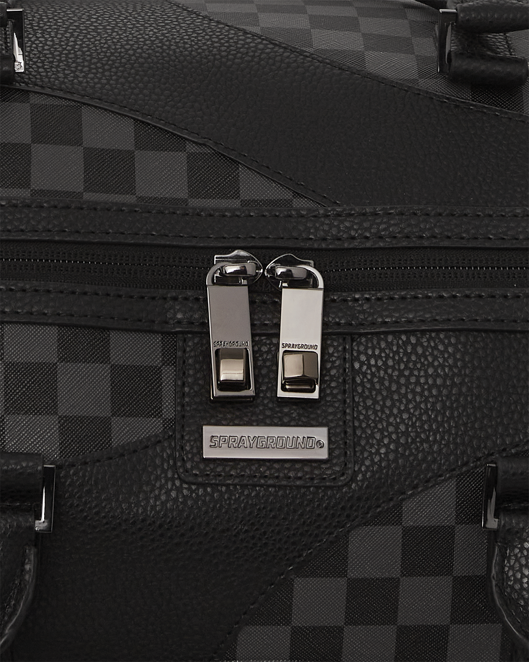 Interior lining detail of designer duffle bags with Sprayground money print