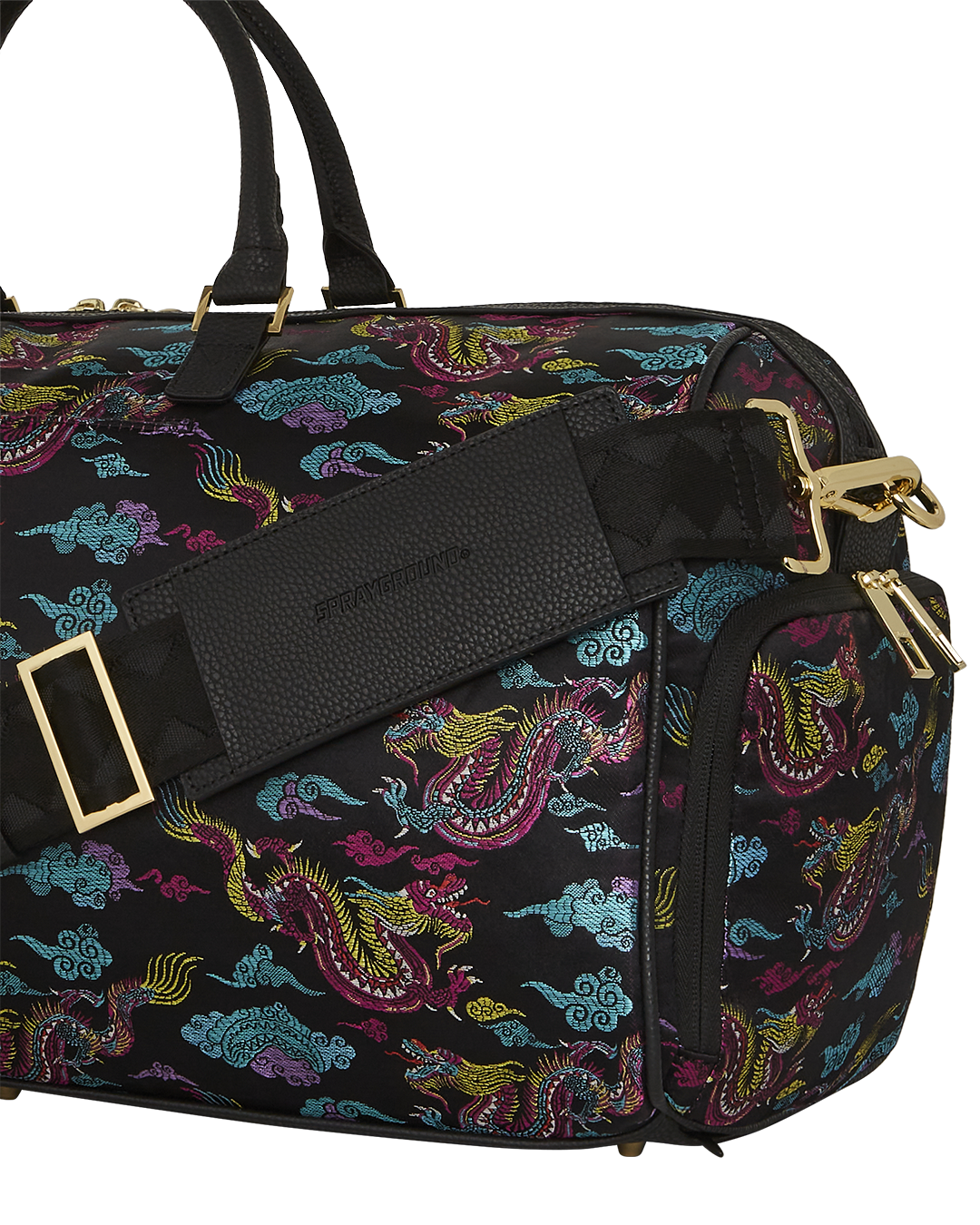 Adjustable straps of the embroidered dragons travel bag for comfort.