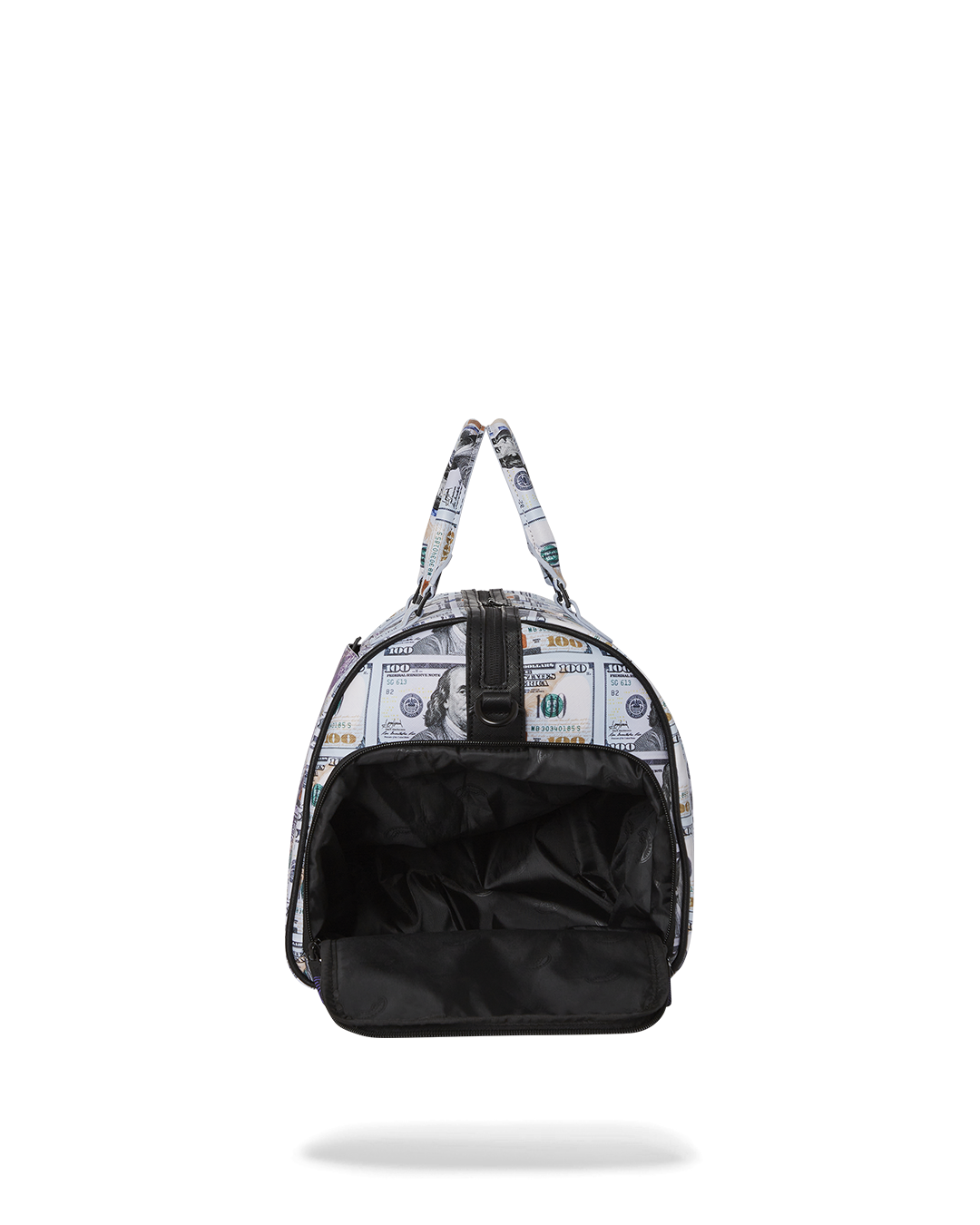 Angled shot of faux leather duffle bag with gold zippers on rooftop terrace.