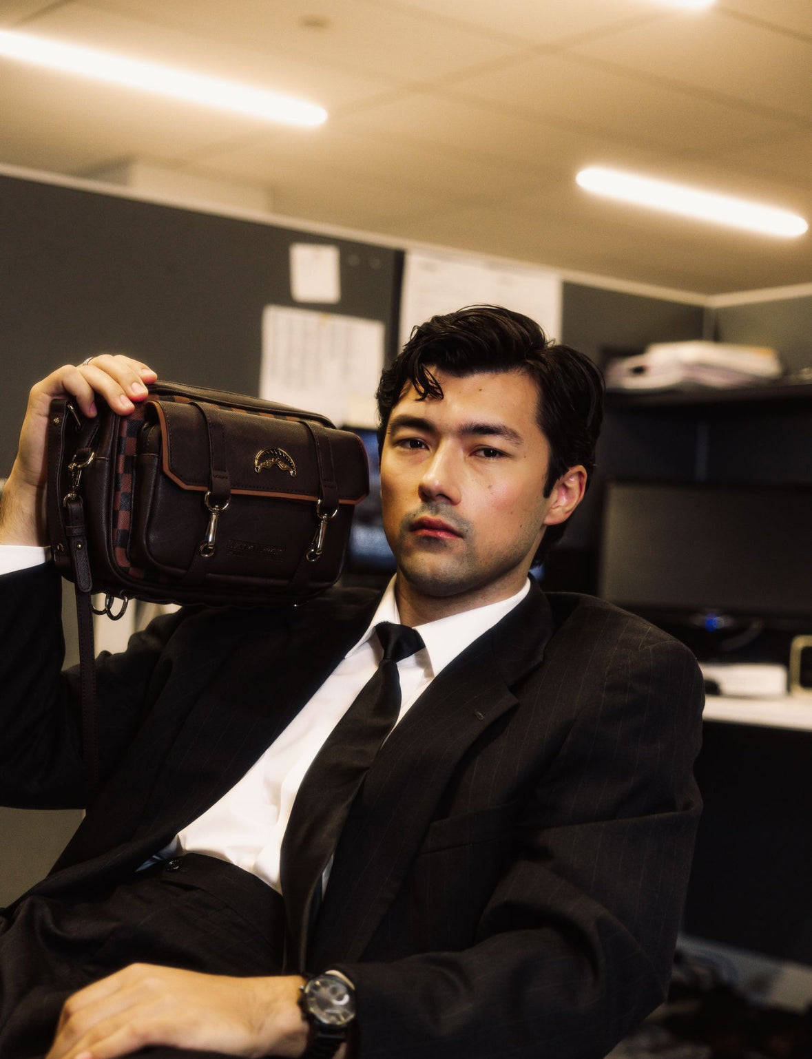 Stylish leather messenger bag for men, carried over the shoulder