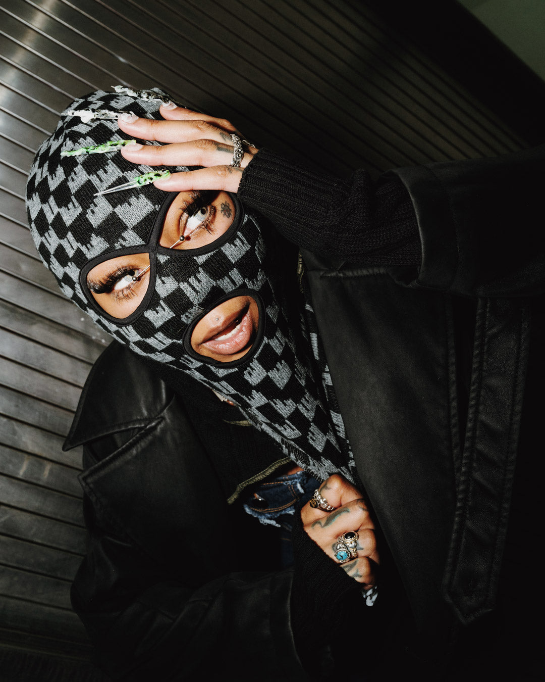 Person wearing the Drench ski mask during snowboarding in winter outdoors