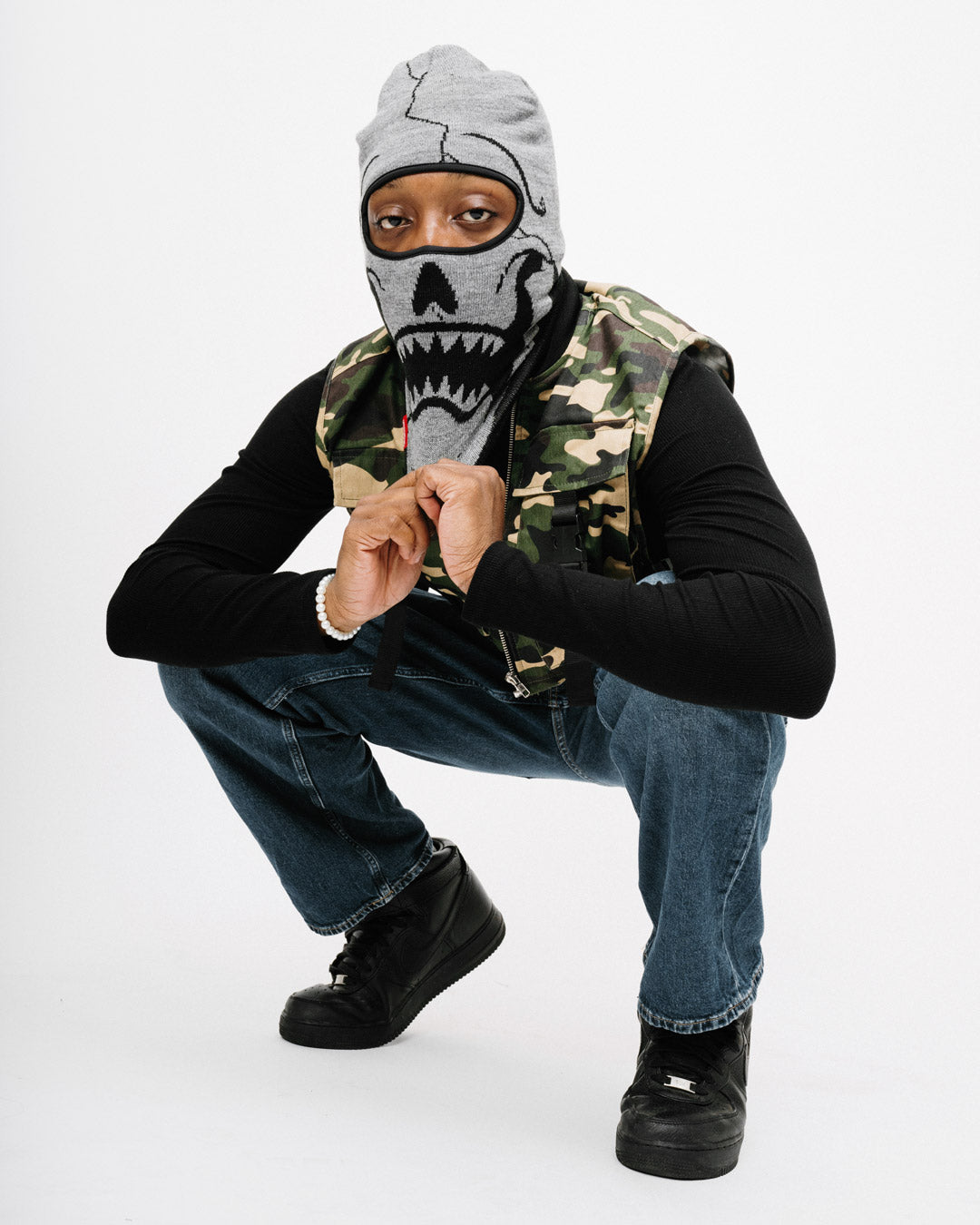 Ski mask laid flat showing full face coverage and durable stitching